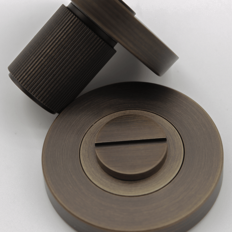 Linear Aged Bronze Privacy Turnsnib Lock detail